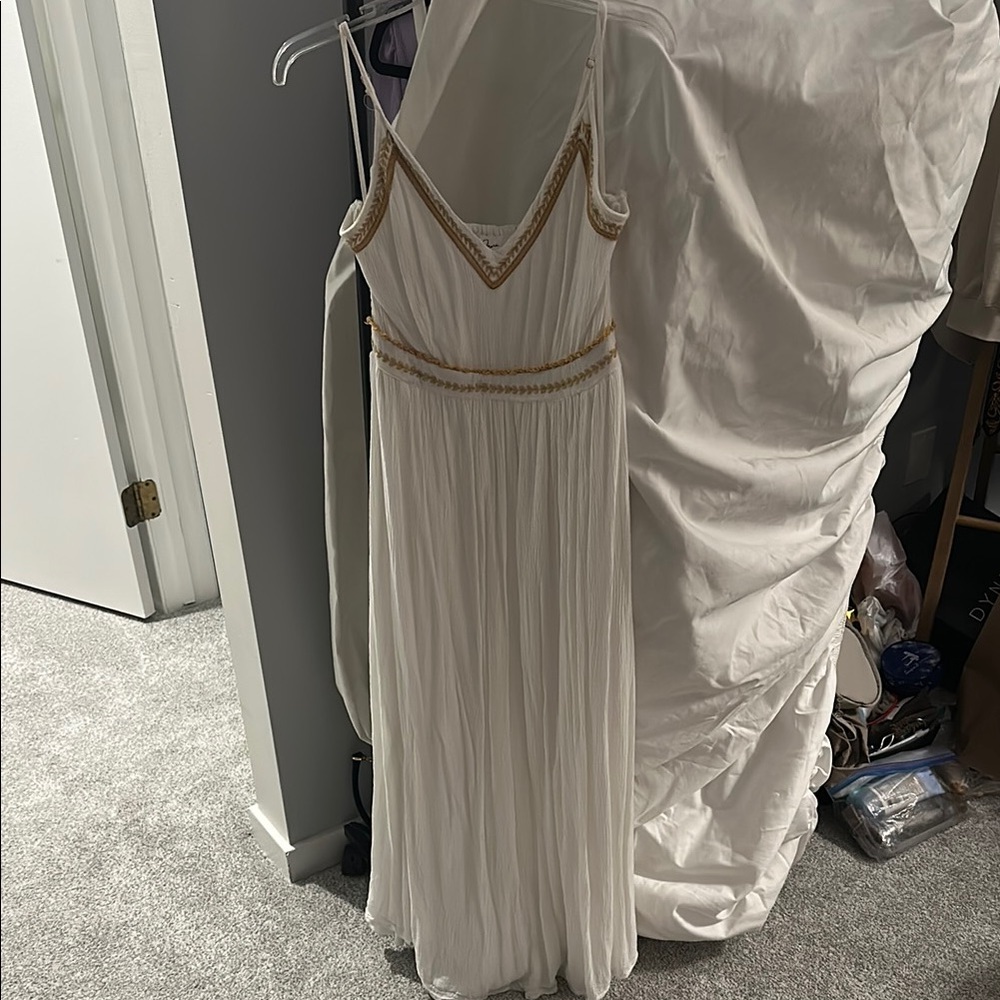Flowy white maxi dress with adjustable straps